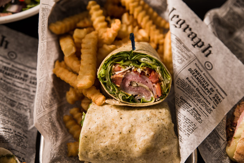 Club Wrap with French Fries Two Brothers Bar & Grill